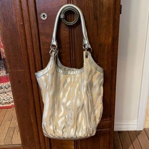 Zebra striped purse it’s silver and tan canvas